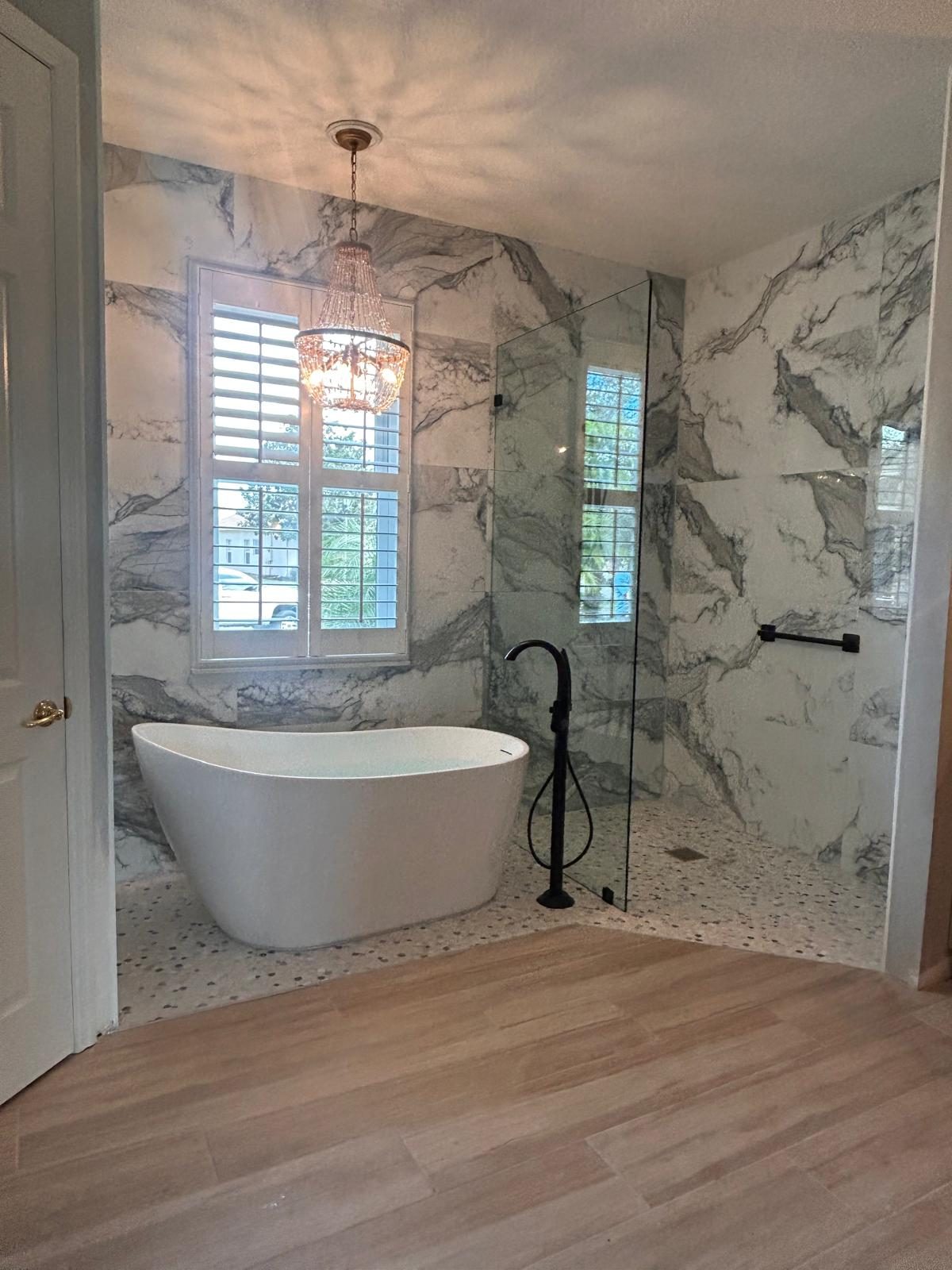 Spa bathroom remodel with freestanding tub
